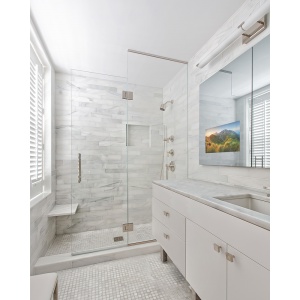 Modern bathroom vanity with a Seura Vanishing Vanity TV Mirror.